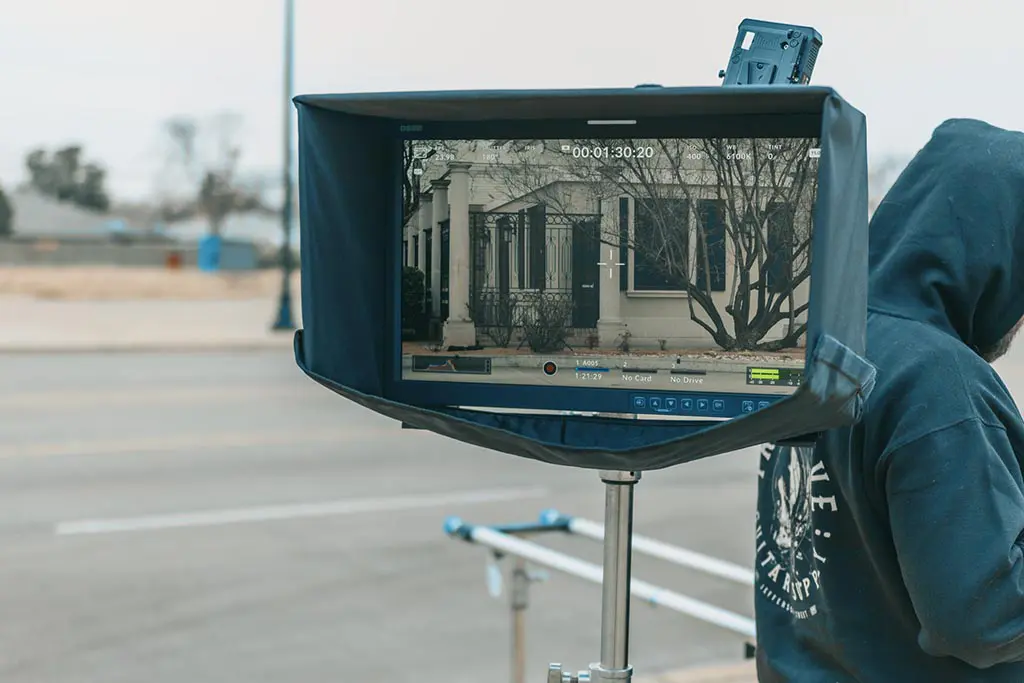 The view of a parking lot automated shot through the Osee 21" monitor